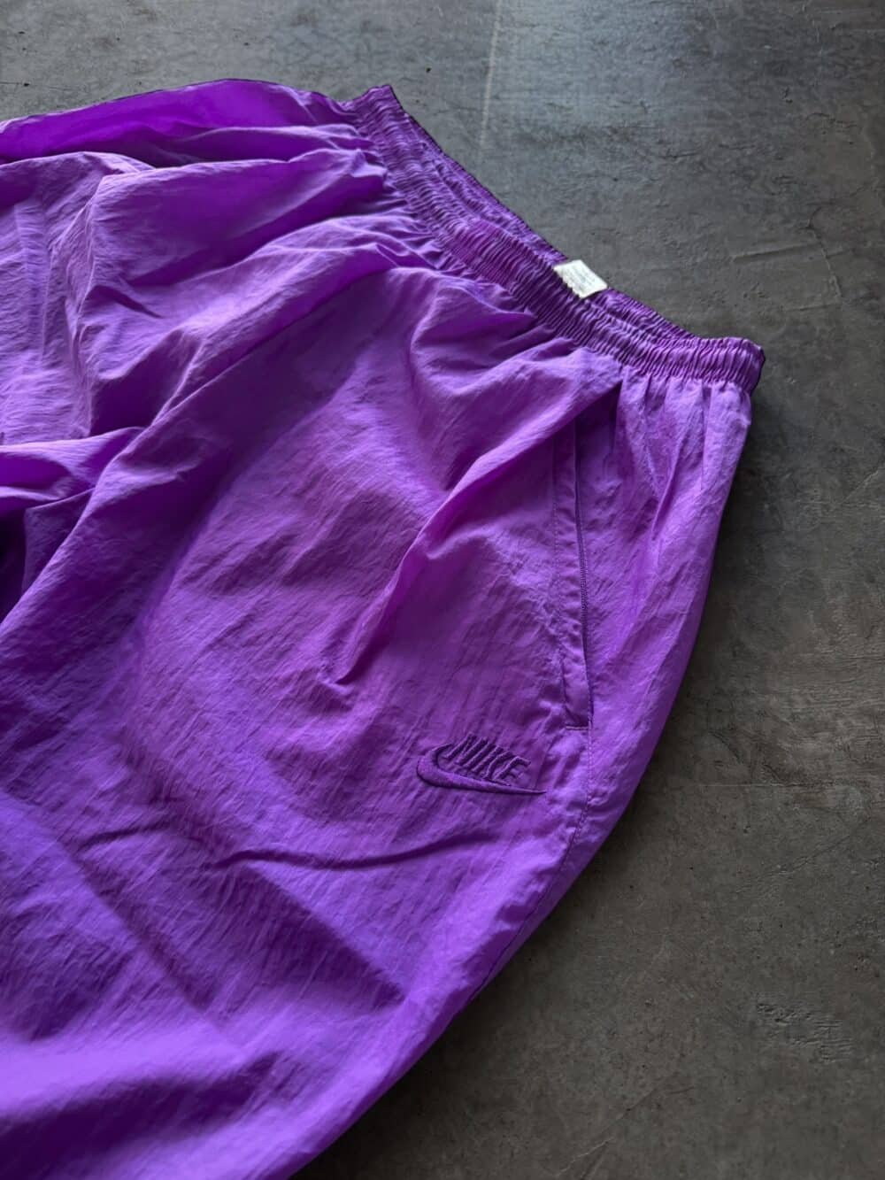Pantalon Rompevientos NIKE (M)
